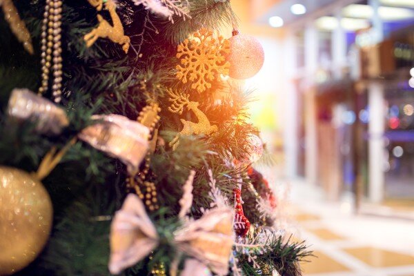 A beautiful Christmas tree in a hotel lobby