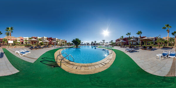 A 360-degree outdoor pool view at a resort.